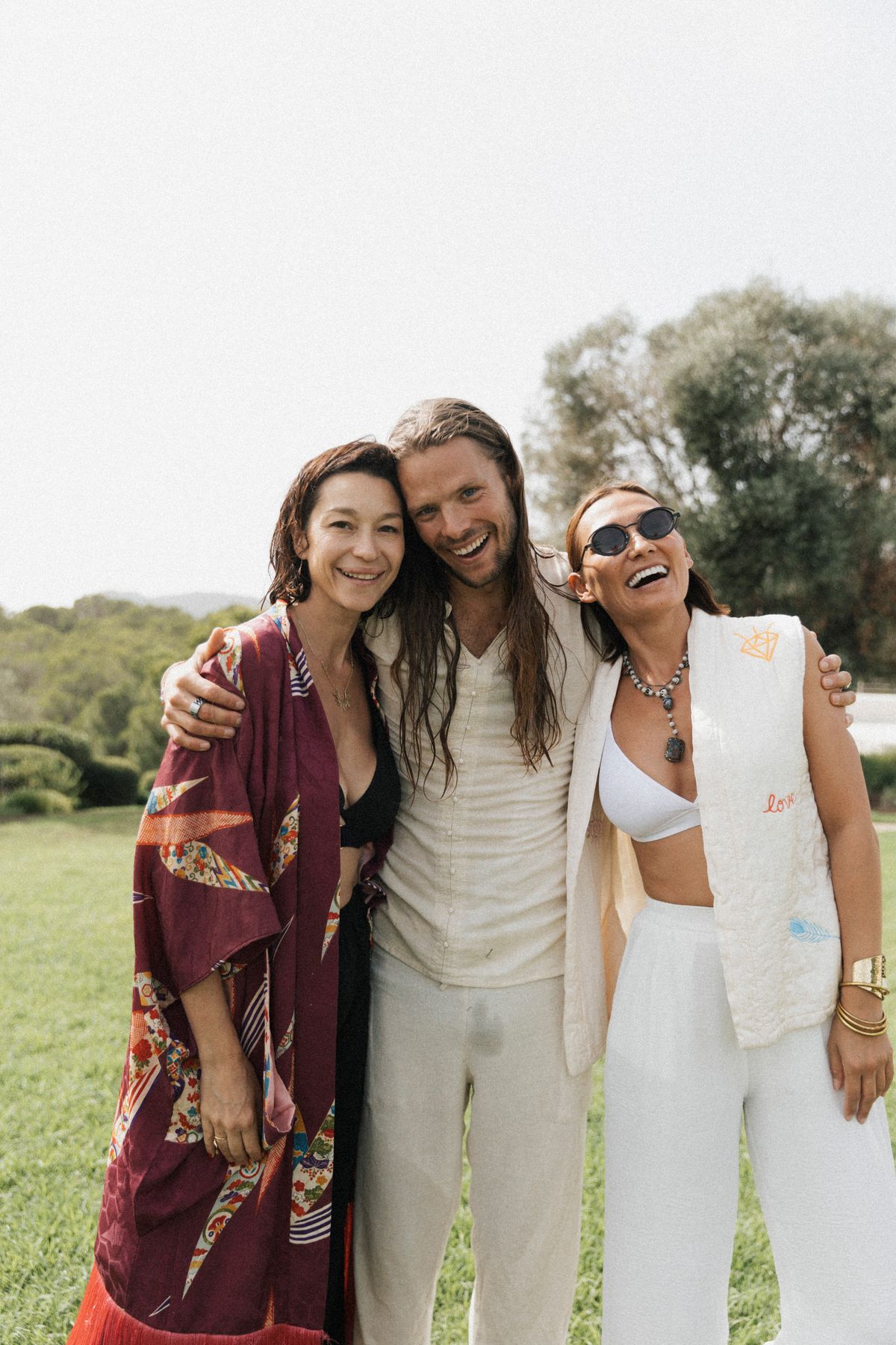 David with retreat organizers, arms around each other, Ibiza 2024