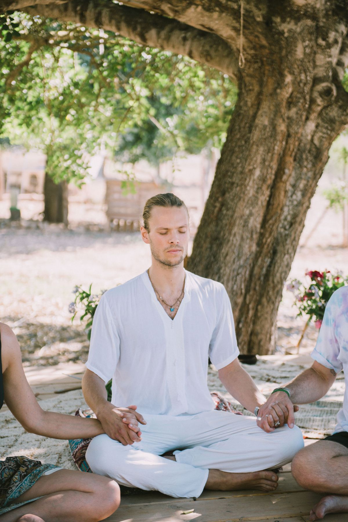 David meditating under a tree in Ibiza 2023