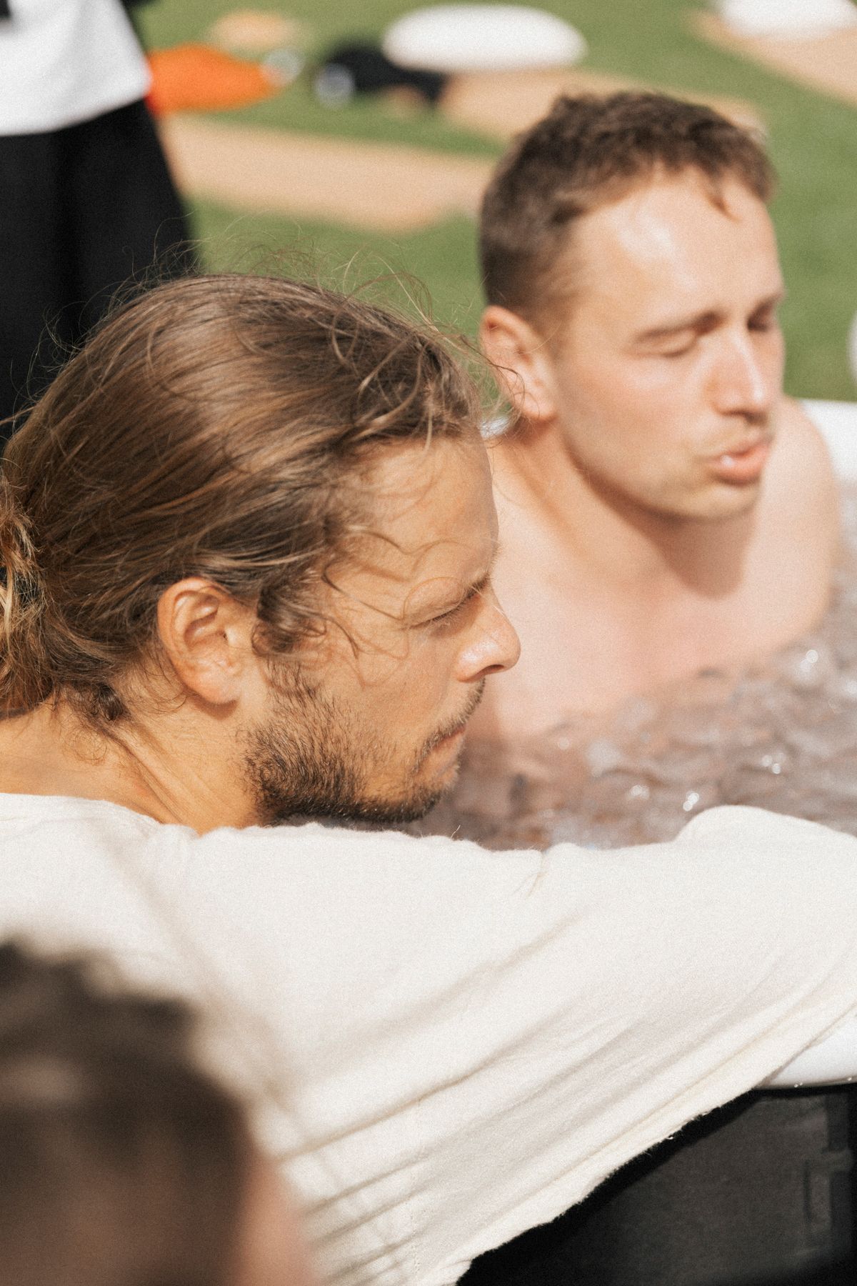 David guiding a client in a cold plunge, Ibiza 2024